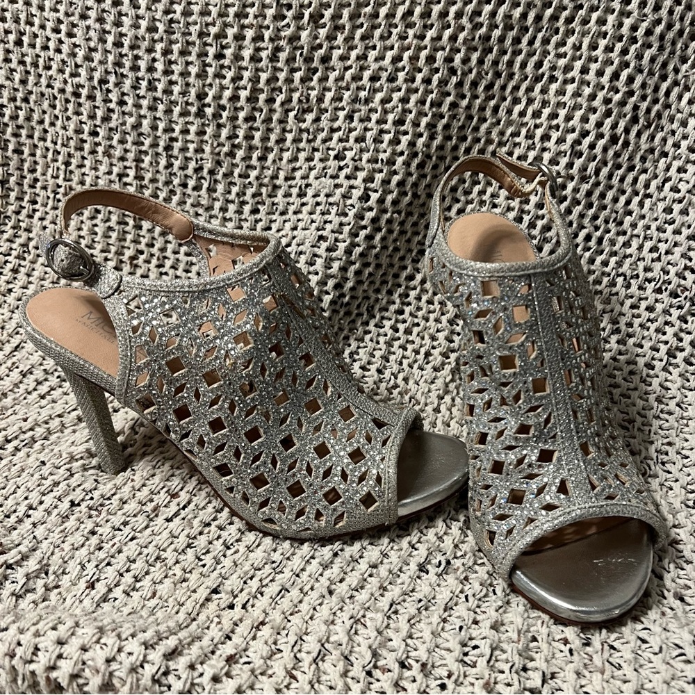 Micheal Shannon Sparkly silver bootie stilettos.